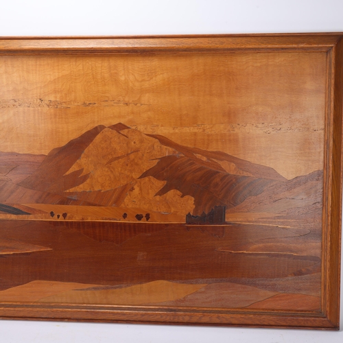 206 - An early 20th century Art Deco marquetry panel in the manner of Rowley Gallery, of Kilchurn Castle, ... 