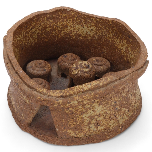 213 - Attributed NORAH DUNBAR, a hand built stoneware model of an African walled village, diameter 22cm