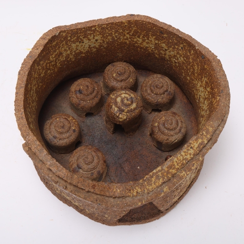 213 - Attributed NORAH DUNBAR, a hand built stoneware model of an African walled village, diameter 22cm