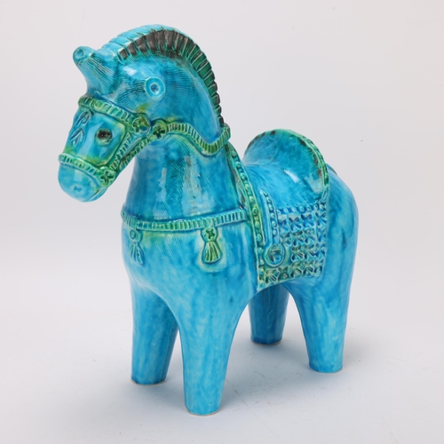 226 - A mid 20th century oriental style ceramic horse, marked to underside Holland 204, height 31cm