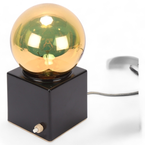 234 - A Philips design coated steel cube lamp with gilded globe bulb, overall height 22cm