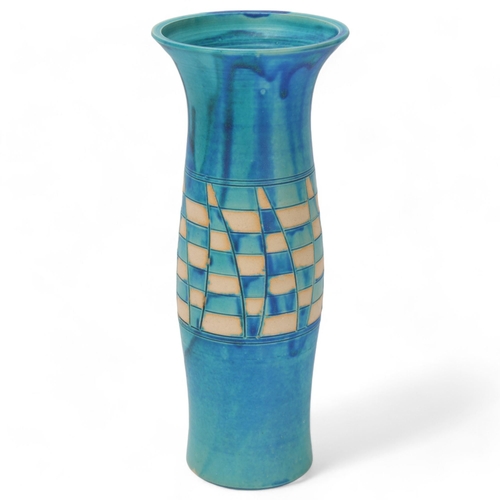 260 - MARIANNE KLOPP, Dublin, a stoneware studio pottery blue and resist glaze vase, makers label and mark... 