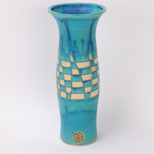 260 - MARIANNE KLOPP, Dublin, a stoneware studio pottery blue and resist glaze vase, makers label and mark... 