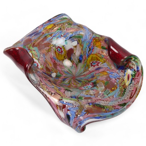 266 - A large Murano Bizantino / Tutti Frutti glass centre bowl, with red folded glass base, attributed AV... 