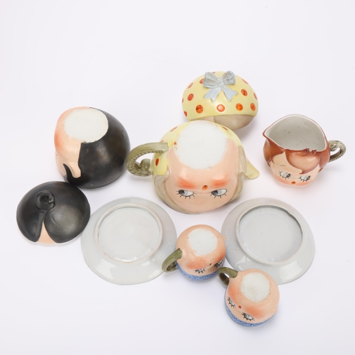 304 - A German bisque porcelain Chloe Preston 'Peek-a-Boo' googly eyed novelty nursery tea service, by Sch... 