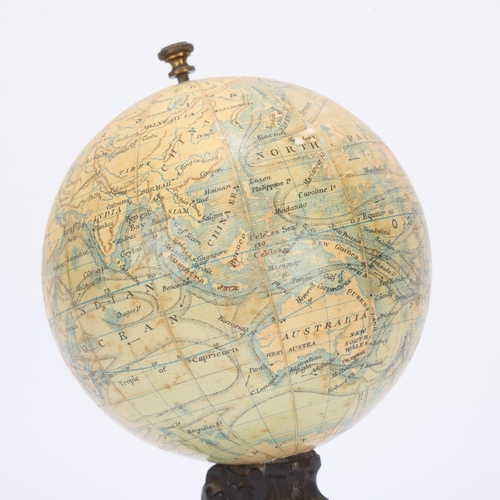 305 - A miniature 19th century desk-top terrestrial globe, by J Lebegue of Paris, on relief cast bronze li... 