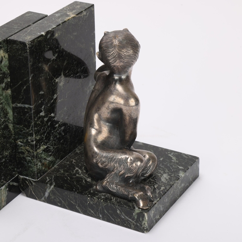 320 - Henry Fugere (1872 - 1944), pair of green marble bookends surmounted by silver patinated bronze figu... 