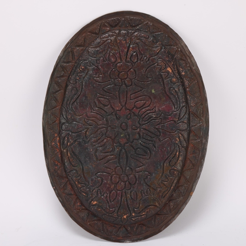 353 - An Islamic oval enamelled dish with stylised animals, 30cm x 21.5cm