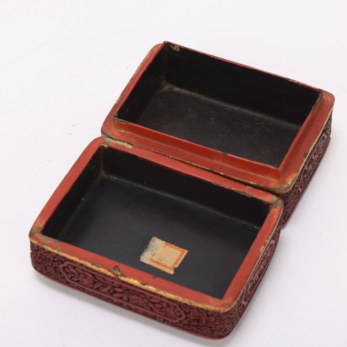 357 - A Chinese 19th century cinnabar lacquer rectangular box, with relief carved decoration, 12cm x 8.5cm... 