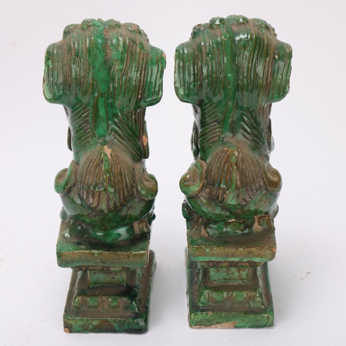 359 - Pair of Chinese green glaze pottery dogs of fo, height 21cm