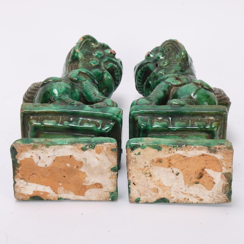 359 - Pair of Chinese green glaze pottery dogs of fo, height 21cm