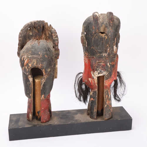 360 - Pair of Chinese carved and painted wood puppet masks on stand, height 38cm