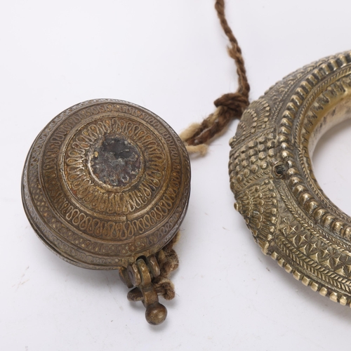 362 - A heavy cast-bronze 2-section slave bangle, diameter 15cm, and an 18th century bronze ball-shaped bo... 