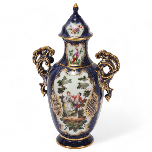 385 - A Worcester blue and gilt porcelain vase and cover, with elaborate scrolled handles, overall height ... 