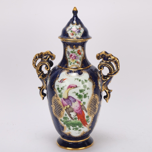 385 - A Worcester blue and gilt porcelain vase and cover, with elaborate scrolled handles, overall height ... 