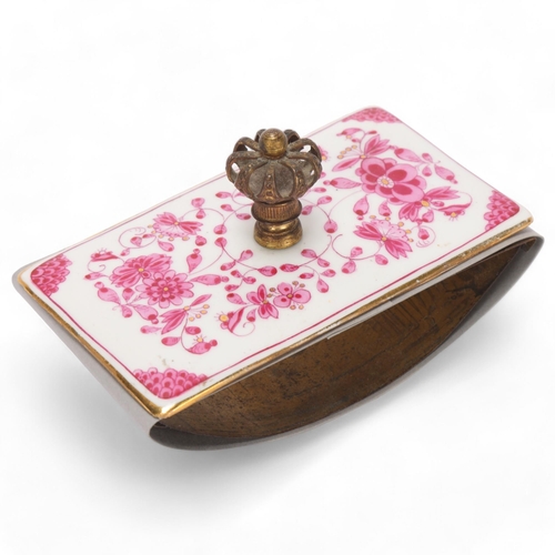 386 - A Meissen porcelain desk blotter, with gilt-brass coronet handle, length 11cm