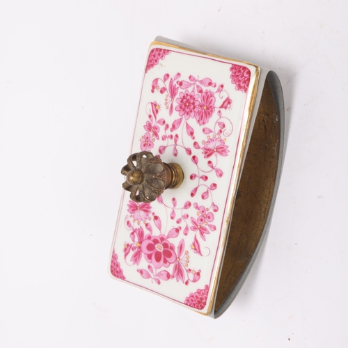 386 - A Meissen porcelain desk blotter, with gilt-brass coronet handle, length 11cm