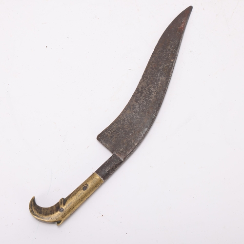 402 - An 18th century Middle Eastern bronze handled knife, length 24cm