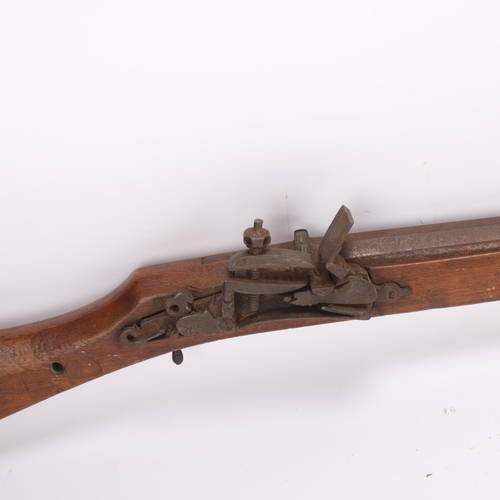 409 - **Withdrawn** Indian North West Frontier flintlock rifle, barrel length 103cm (A/F)