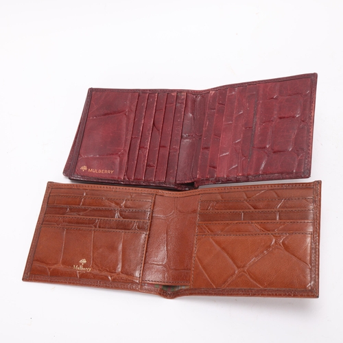 435 - Two Mulberry wallets in Brown and Red leather, one with original receipt