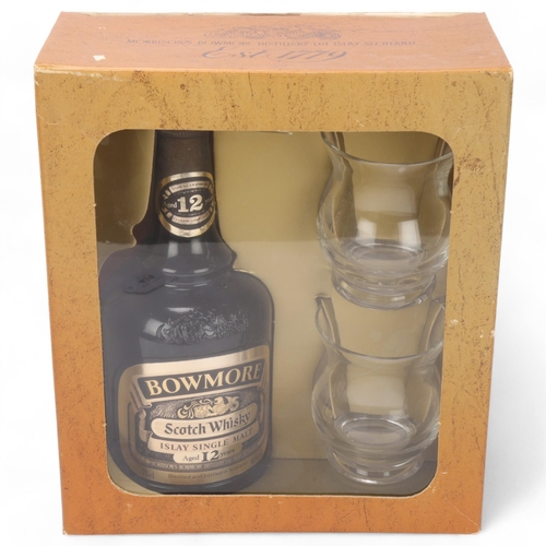 436 - Bowmore 12 years old Islay Single Malt Whisky, in original presentation box with two glasses and pam... 