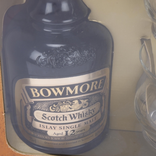 436 - Bowmore 12 years old Islay Single Malt Whisky, in original presentation box with two glasses and pam... 