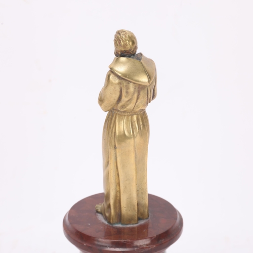 524 - A bronze figure of a monk on specimen marble base, unsigned, height 19cm