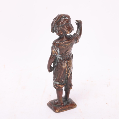 525 - A small patinated bronze figure of a child, indistinct signature, height 10cm