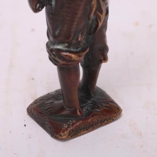 525 - A small patinated bronze figure of a child, indistinct signature, height 10cm