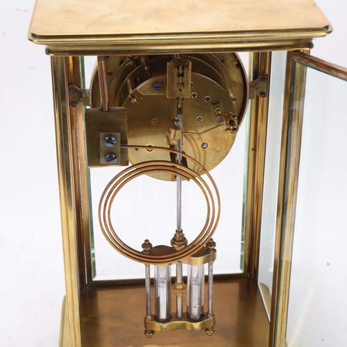 531 - A brass-cased 4-glass regulator clock with enamel dial, case height 30cm, with key and pendulum