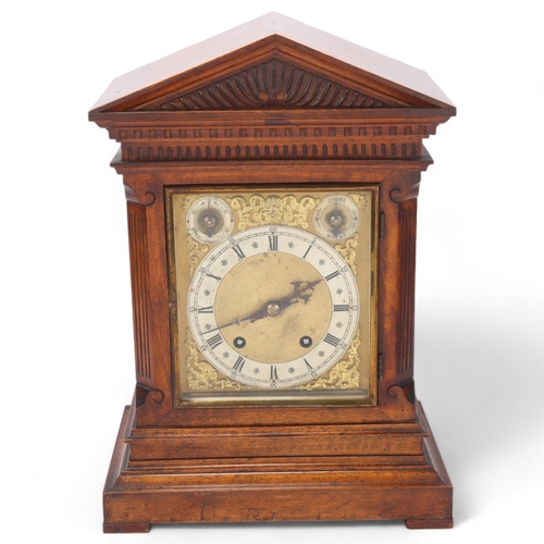 532 - A Continental carved walnut-cased architectural 8-day mantel clock, case height 42cm, with key and p... 