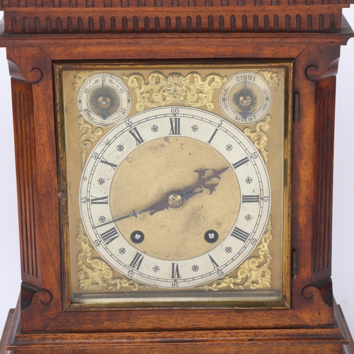 532 - A Continental carved walnut-cased architectural 8-day mantel clock, case height 42cm, with key and p... 