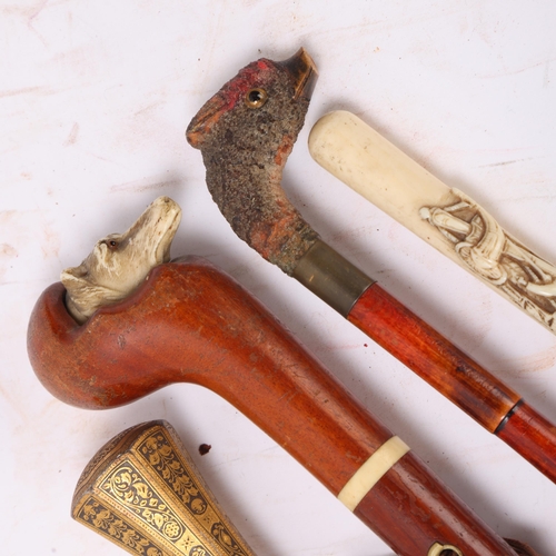 537 - A group of 19th century walking sticks and umbrellas (4)