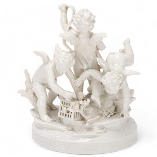 541 - A German white glaze porcelain group of 3 cherubs, height 25cm