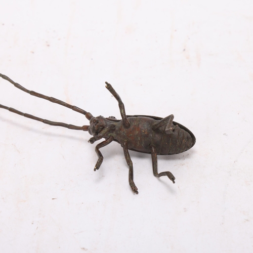 553 - A Meiji period century Japanese patinated bronze jizai okimono articulated cricket, length 13cm