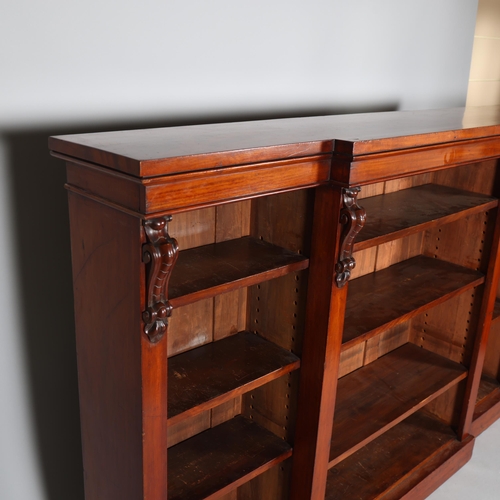 311 - Mid-Victorian mahogany break front bookcase, with scroll top column detail, height 119cm, width 185c... 