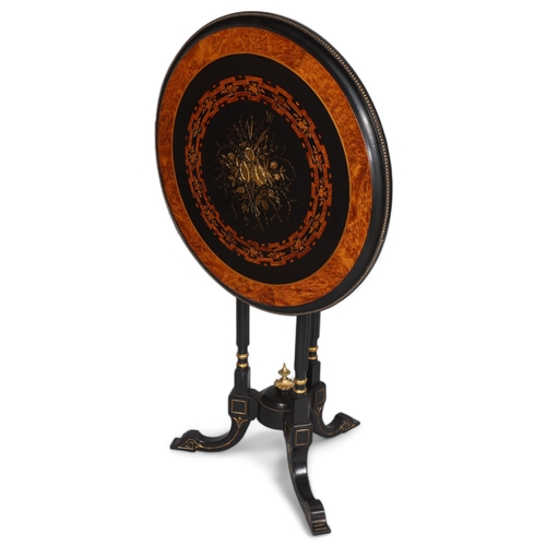 366 - A Victorian ebonised mahogany tilt top table with burr walnut and gilt detail, height 119, top diame... 