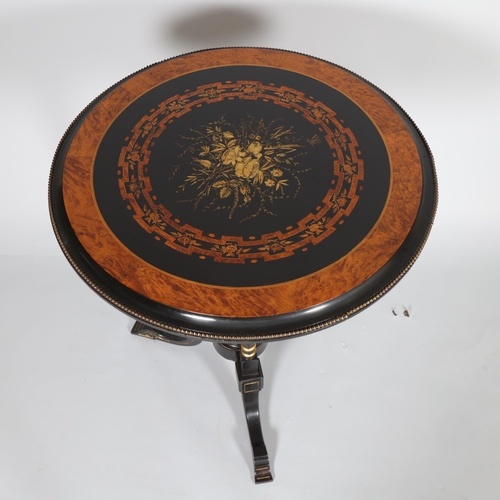 366 - A Victorian ebonised mahogany tilt top table with burr walnut and gilt detail, height 119, top diame... 