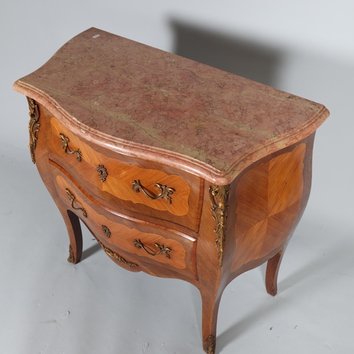 373 - A French kingwood veneered and satinwood strung commode chest of two drawers, with ormulu rococo mou... 