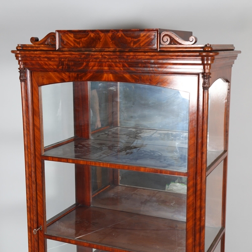 377 - A 19th century flame mahogany glazed display cabinet, with 3 shelves and drawer under, glazed to thr... 