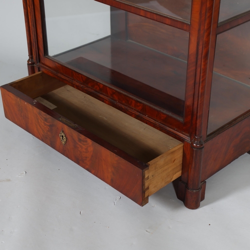 377 - A 19th century flame mahogany glazed display cabinet, with 3 shelves and drawer under, glazed to thr... 