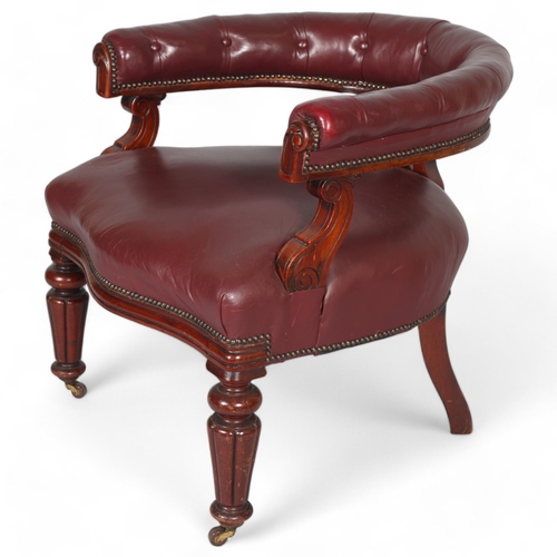 492 - An early 19th century mahogany framed bow-arm office chair, with buttoned Morocco leather upholstery... 