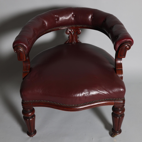 492 - An early 19th century mahogany framed bow-arm office chair, with buttoned Morocco leather upholstery... 