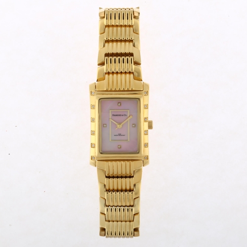 1035 - DIAMOND & CO - a lady's gold plated stainless steel quartz bracelet watch, ref. DC012, pink mother-o... 