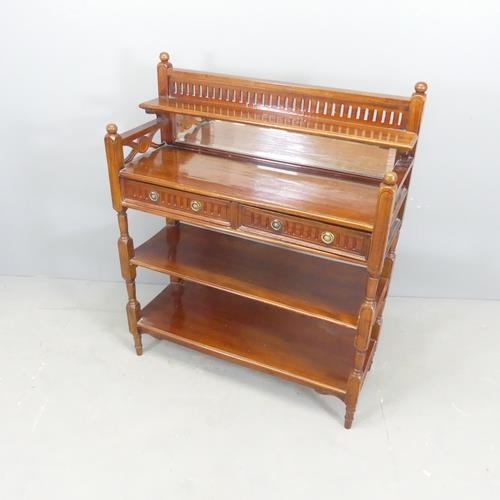 2116 - A continental mahogany three-tier buffet, with raised mirror back and two drawers, and carved and pi... 