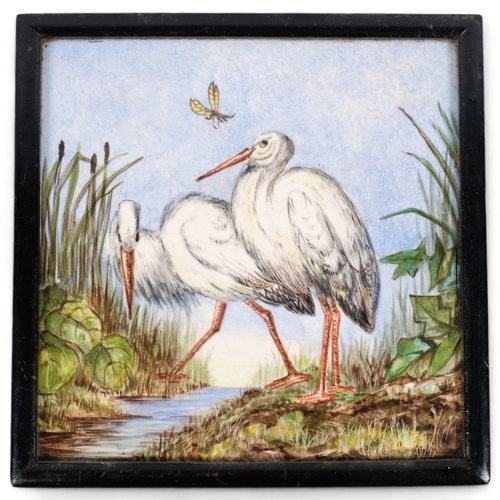 575 - A large hand painted early 20th century tile of egrets, framed, 22cm square