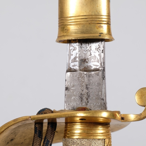 417G - A 20th British Naval Officer's sword, with gilt mounts and leather sheath, etched blade, no maker's ... 