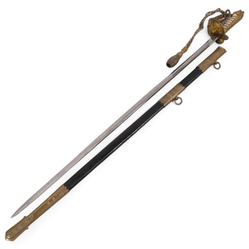 417H - A George VI Naval Officer's sword, with gilt-bronze mounts  and leather sheath and faux shagreen han... 