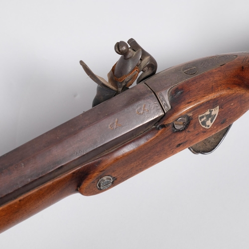 417L - A 19th century long barrelled flintlock fowling gun by Cook, good patinated walnut stock, engraved m... 