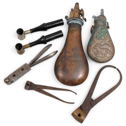 417J - A collection of 18th and 19th century gun-related tools, 2 powder flasks, 2 powder pourers, and 3 bu... 